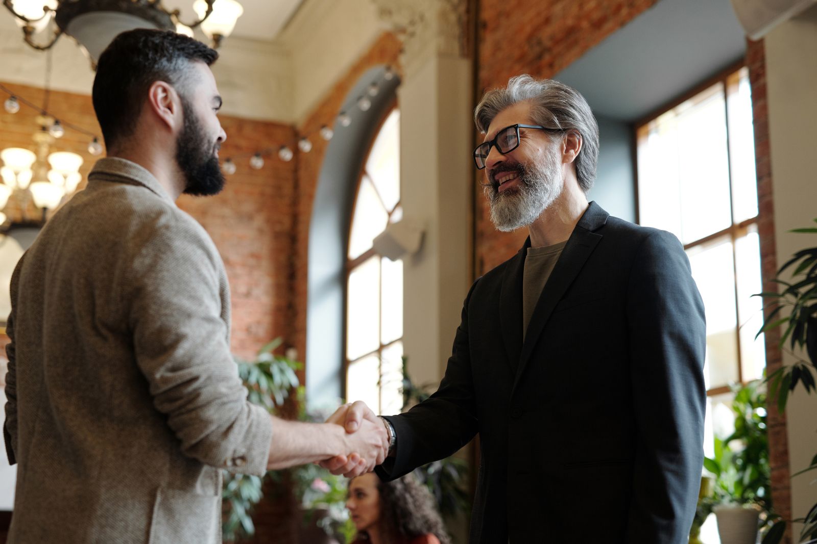 Business partnership handshake
